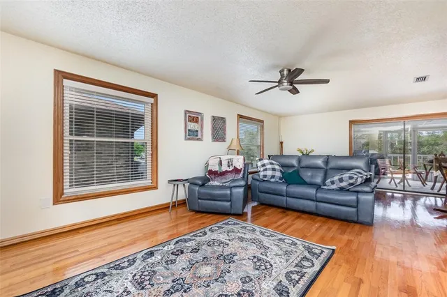 a living room with furniture and a rug