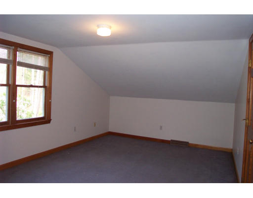 8 Skinners Road Groton, MA 01450 - Photo 11 of 21 a view of an empty room with a window