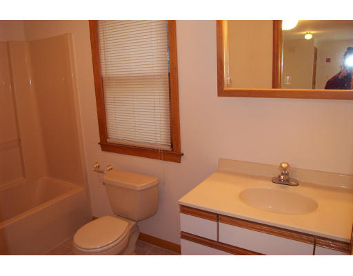 8 Skinners Road Groton, MA 01450 - Photo 13 of 21 a bathroom with a toilet a sink and bathtub