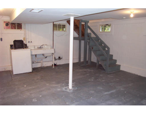 8 Skinners Road Groton, MA 01450 - Photo 15 of 21 a view of a livingroom with furniture and stairs