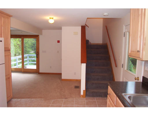 8 Skinners Road Groton, MA 01450 - Photo 6 of 21 a view interior of a house with wooden floor and windows