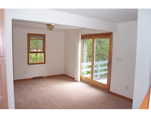 8 Skinners Road Groton, MA 01450 - Photo 7 of 21 a view of a room that has a window