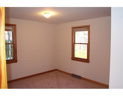 8 Skinners Road Groton, MA 01450 - Photo 8 of 21 a view of an empty room with a window
