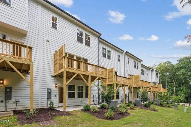 a utility room with a sink and washing machine