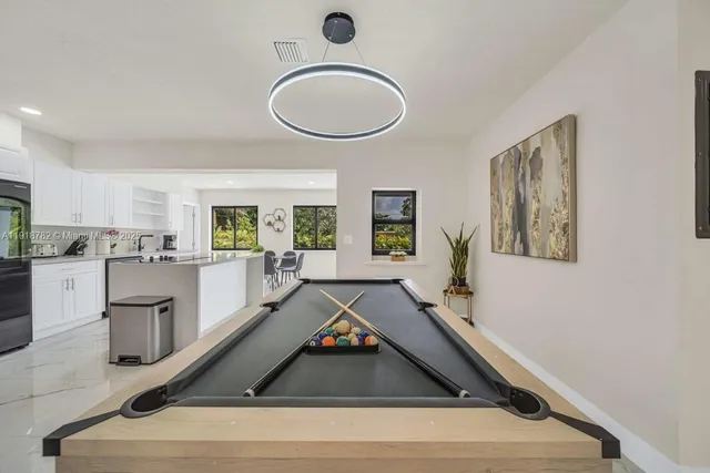 a view of living room and kitchen