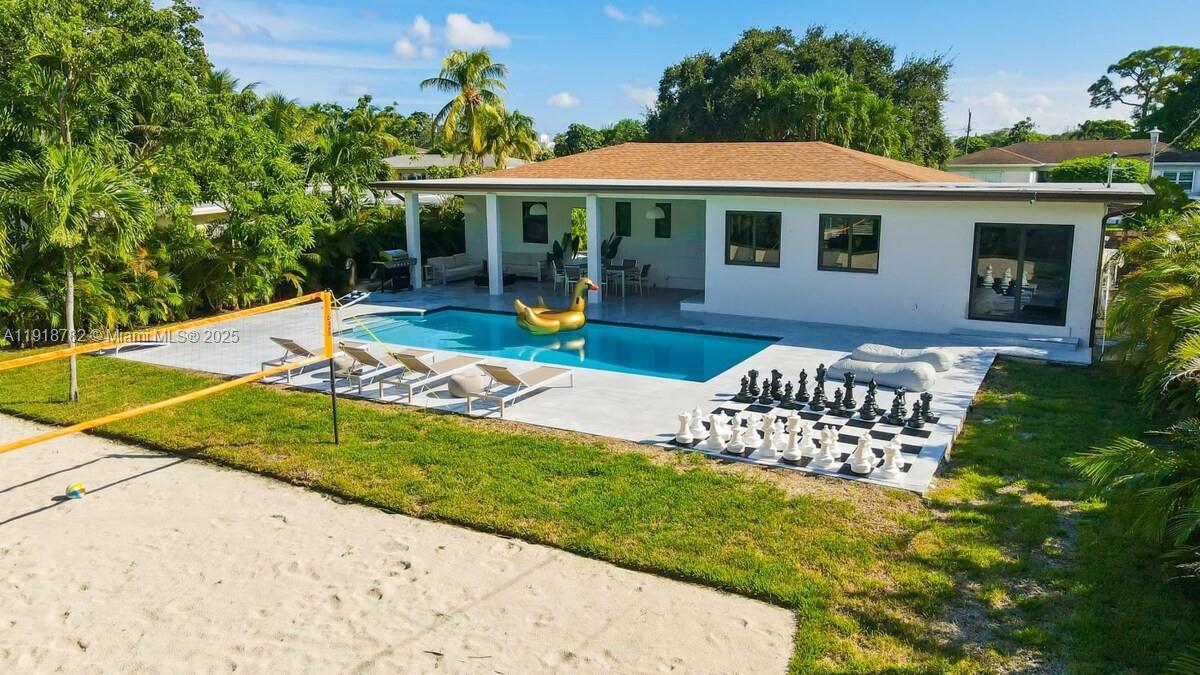 305 Northwest 124th Street North Miami, FL 33168 - Photo 40 of 41 a view of a house with backyard and sitting area