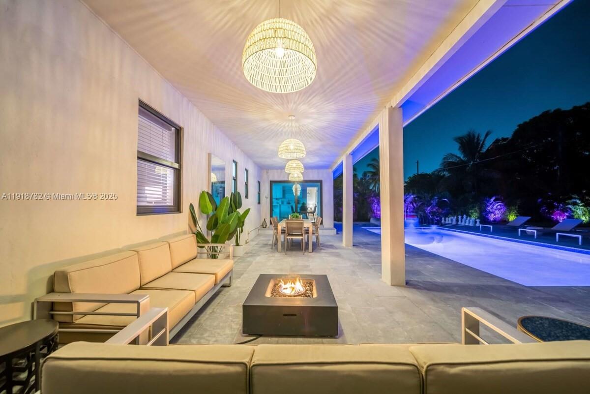 305 Northwest 124th Street North Miami, FL 33168 - Photo 8 of 41 a view of a livingroom with furniture and a chandelier