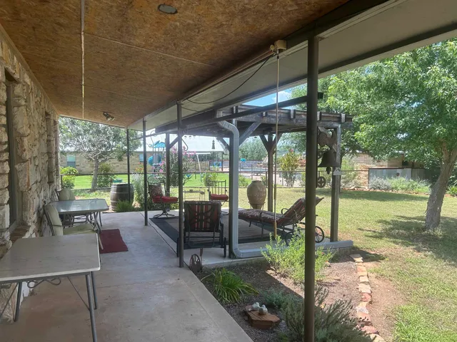 a view of a swimming pool and outdoor space