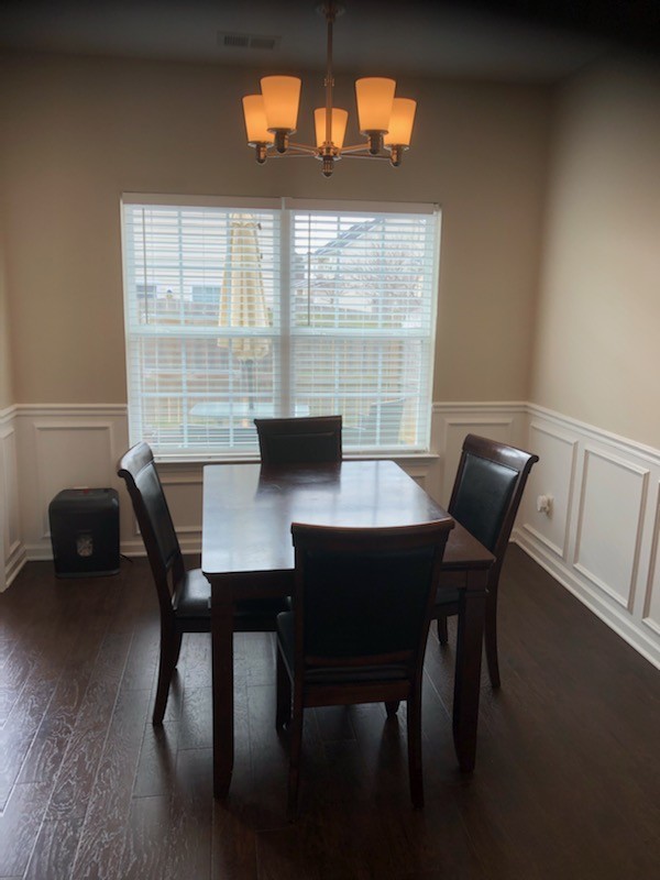435 Kubota Drive Murfreesboro, TN 37128 - Photo 3 of 8 a view of a dining room with furniture and wooden floor