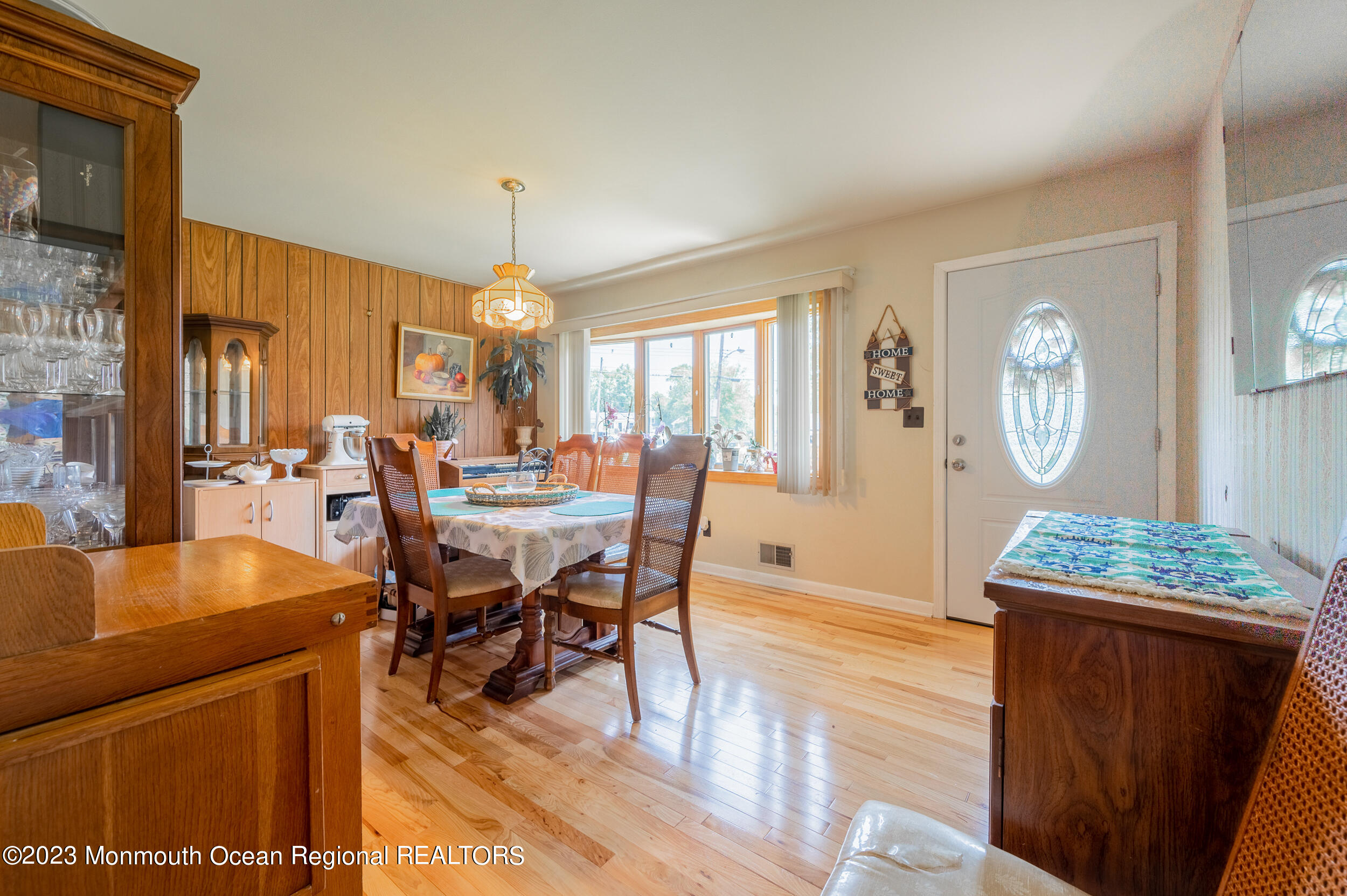 3 Amherst Road Toms River, NJ 08757 - Photo 6 of 19 a view of a dining room with furniture and a chandelier