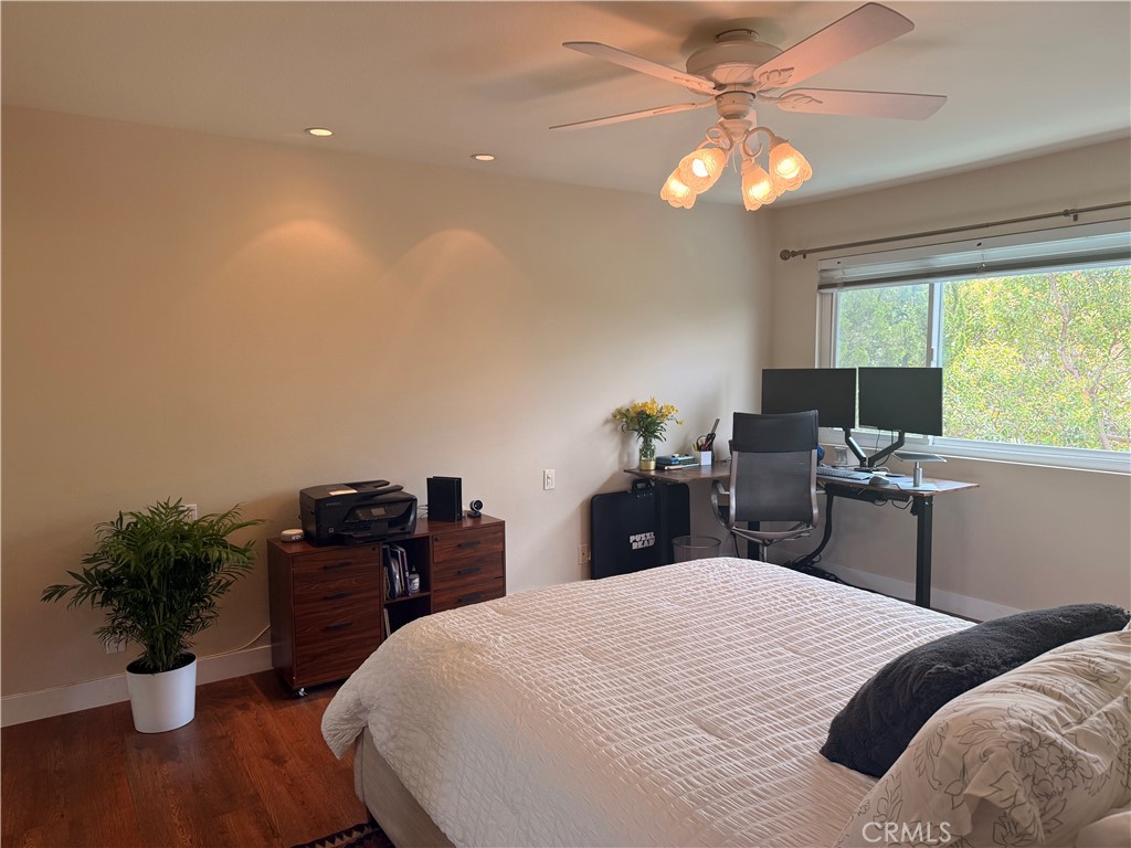 19238 Castlebay Lane Porter Ranch, CA 91326 - Photo 20 of 38 a bedroom with a bed and a potted plant