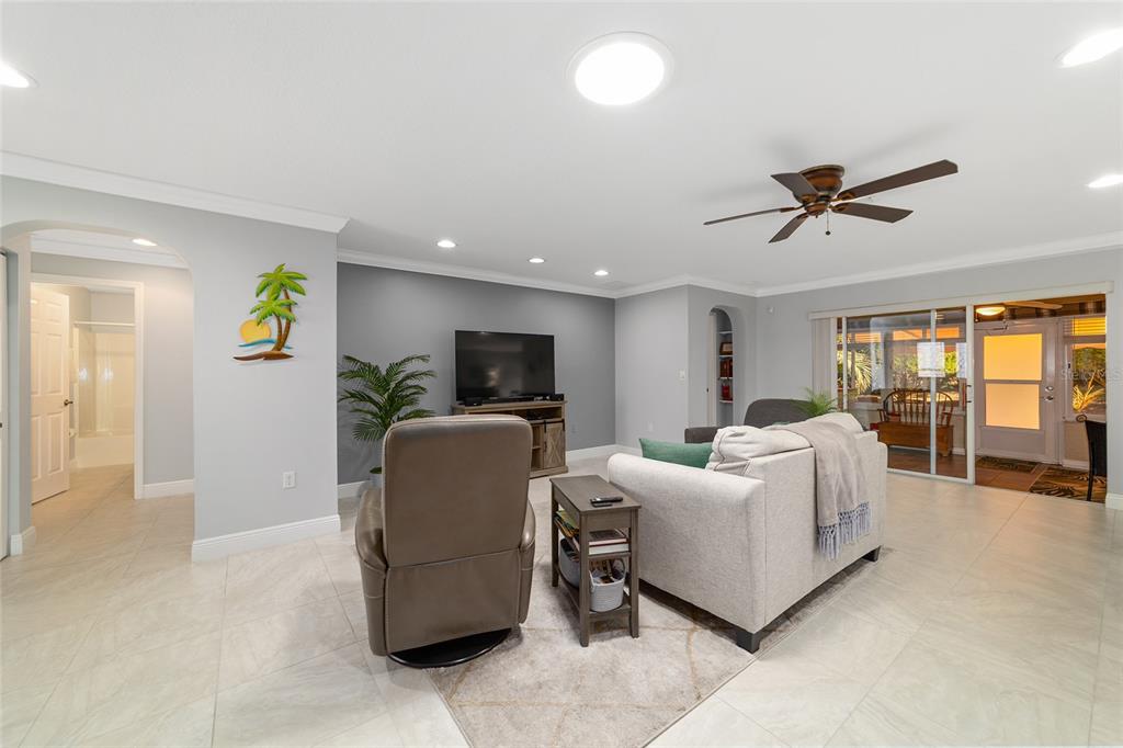 8125 South W 81st Loop Ocala, FL 34476 - Photo 11 of 58 a living room with furniture and a flat screen tv