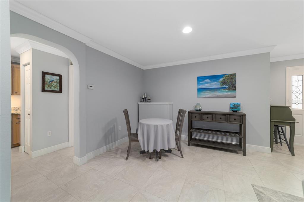 8125 South W 81st Loop Ocala, FL 34476 - Photo 20 of 58 a living room with furniture and a chair