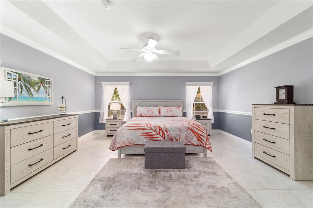 8125 South W 81st Loop Ocala, FL 34476 - Photo 33 of 58 a bedroom with a bed and a dresser