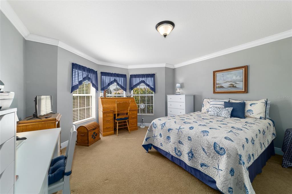 8125 South W 81st Loop Ocala, FL 34476 - Photo 40 of 58 a bedroom with bed and window