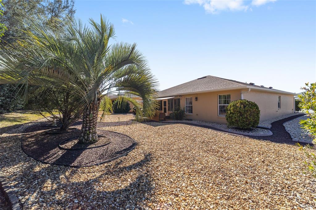 8125 South W 81st Loop Ocala, FL 34476 - Photo 56 of 58 a front view of a house with a yard