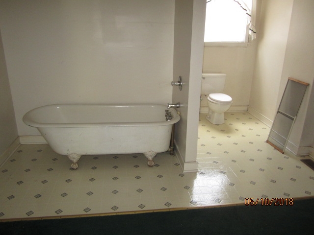 515 Ridge Street Charlottesville, VA 22902 - Photo 14 of 15 a bathroom with a sink toilet and shower