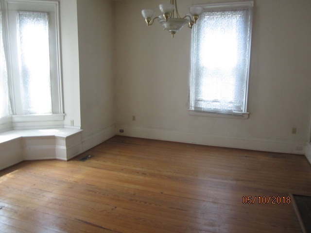515 Ridge Street Charlottesville, VA 22902 - Photo 5 of 15 an empty room with a window