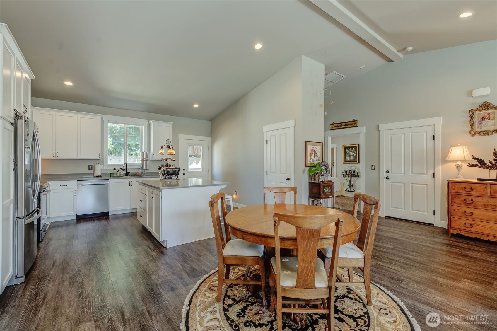 227 Pershing Circle Wenatchee, WA 98801 - Photo 15 of 38 a view of a dining room with furniture and wooden floor