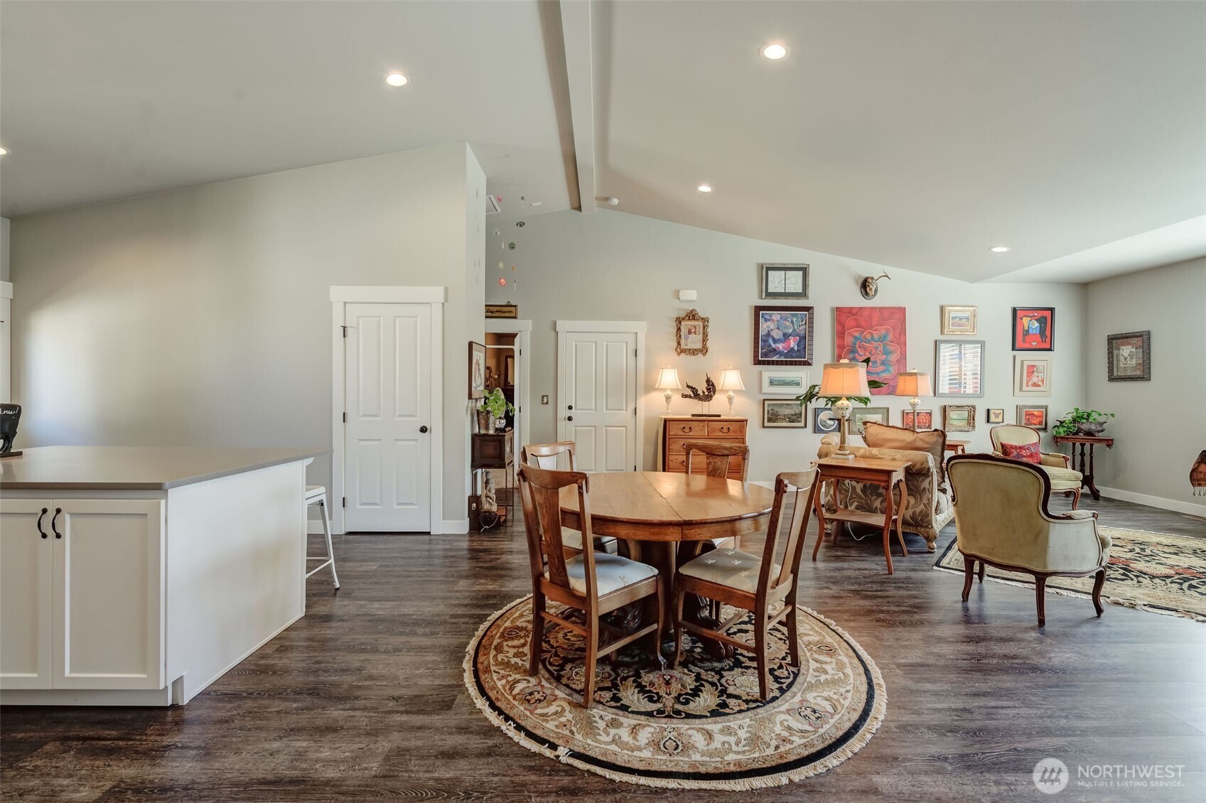 227 Pershing Circle Wenatchee, WA 98801 - Photo 16 of 38 a living room with furniture a dining table and kitchen view