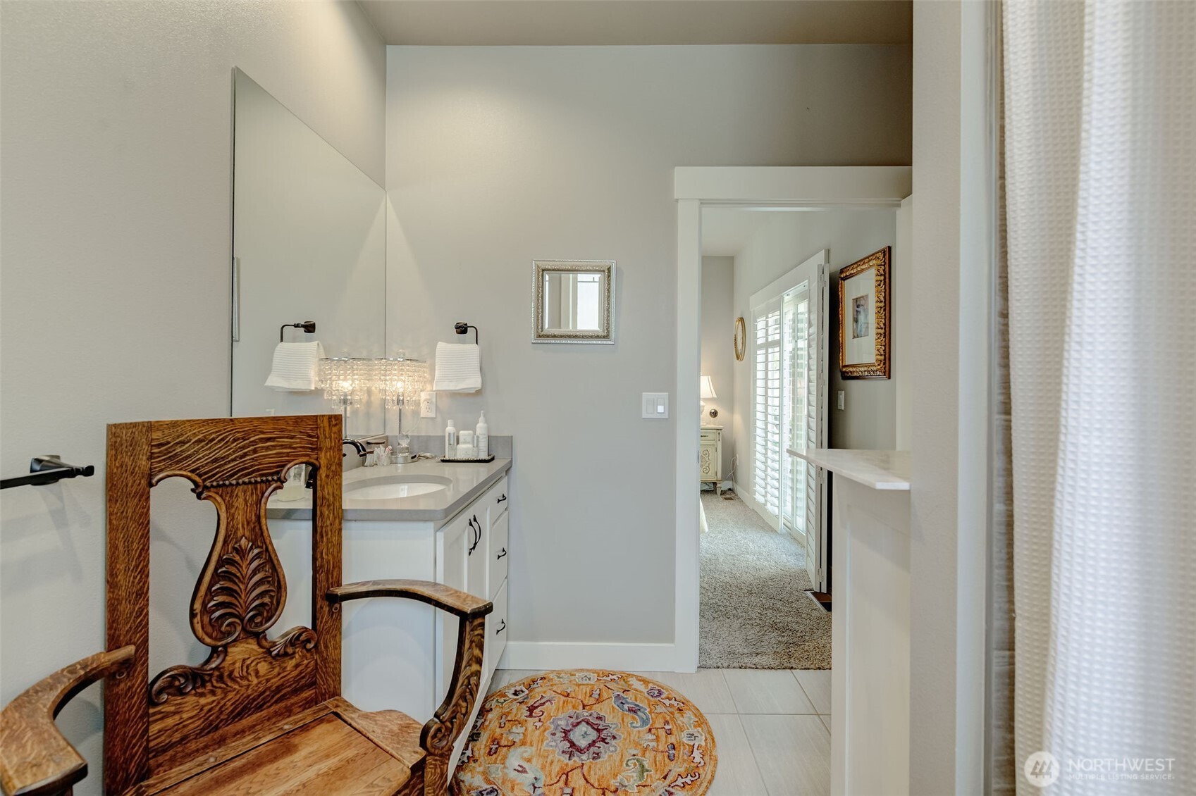 227 Pershing Circle Wenatchee, WA 98801 - Photo 22 of 38 a bathroom with a granite countertop sink mirror and vanity