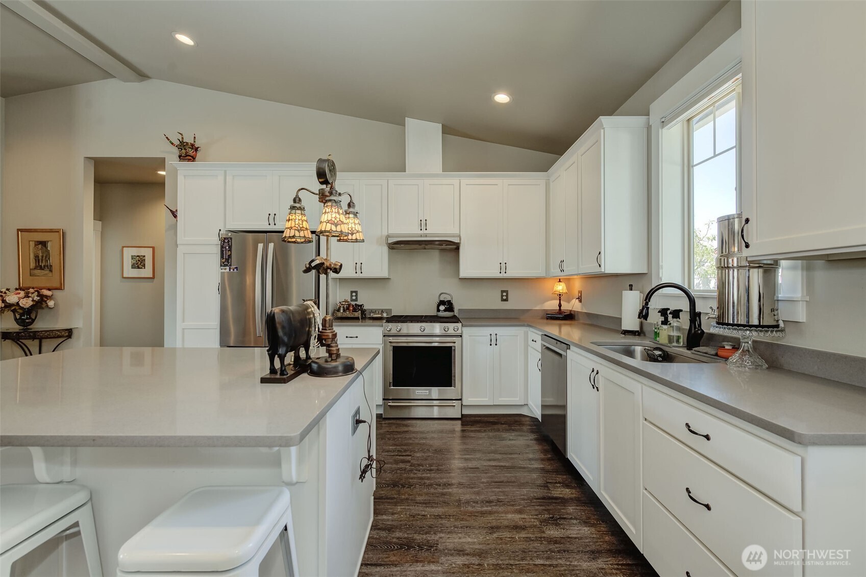 227 Pershing Circle Wenatchee, WA 98801 - Photo 8 of 38 a kitchen with a sink stove and cabinets