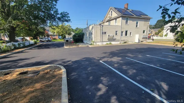 a view of multiple houses with a street