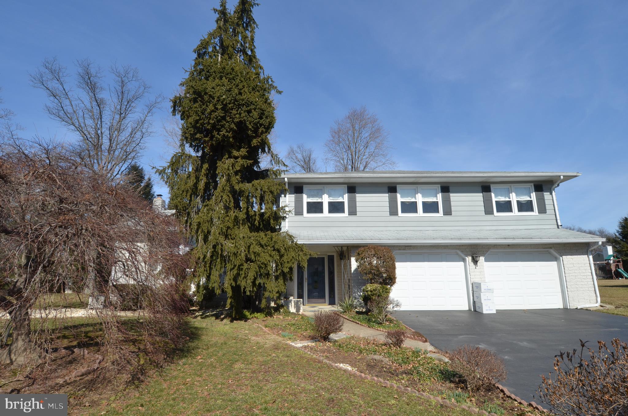 14 Azalea Way Hamilton, NJ 08690 - Photo 1 of 33 a front view of a house with a yard