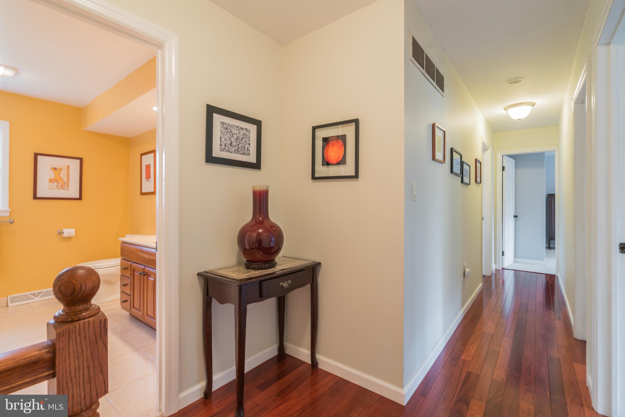 14 Azalea Way Hamilton, NJ 08690 - Photo 17 of 33 a view of hallway with livingroom and wooden floor