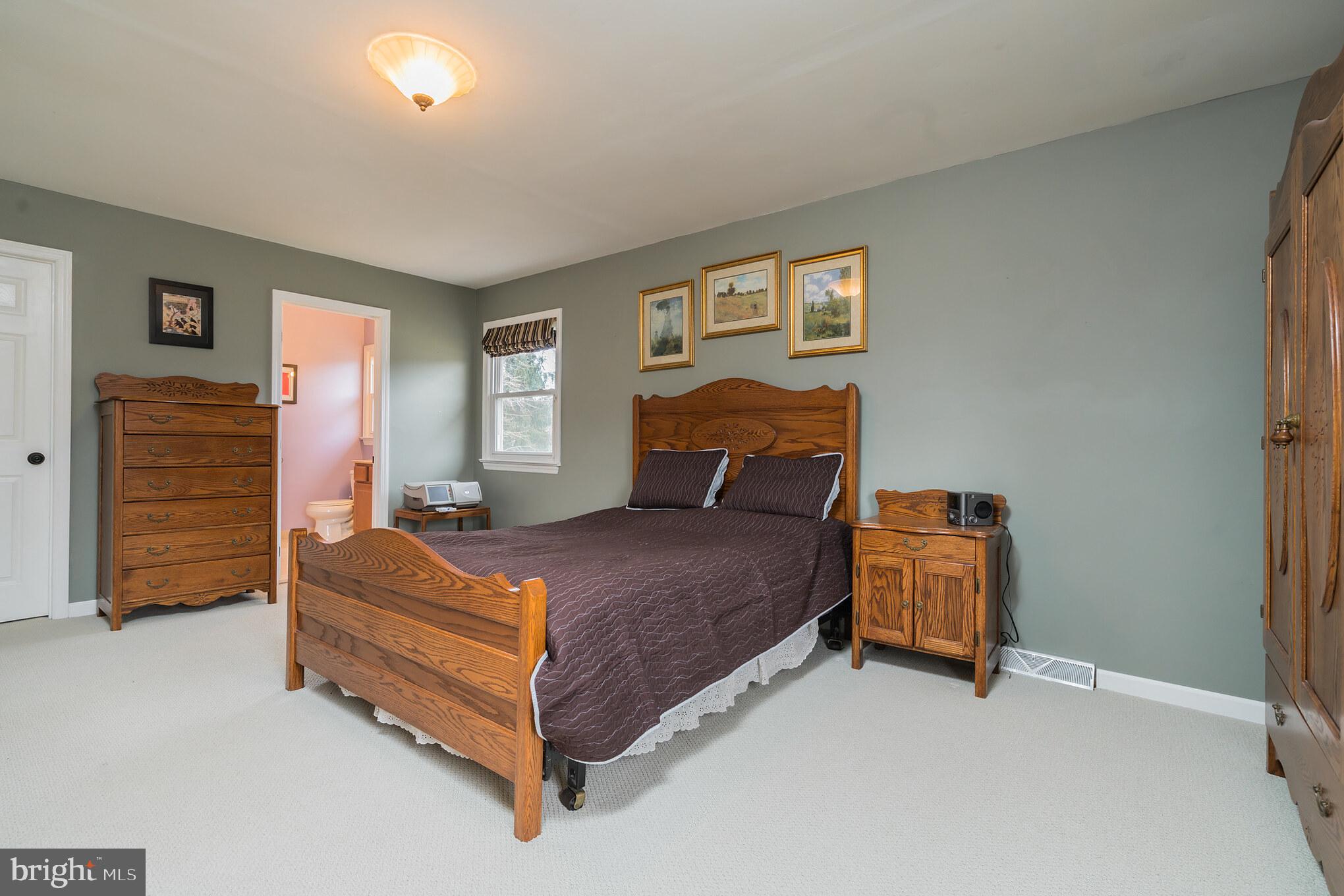 14 Azalea Way Hamilton, NJ 08690 - Photo 19 of 33 a bedroom with a bed and a dresser