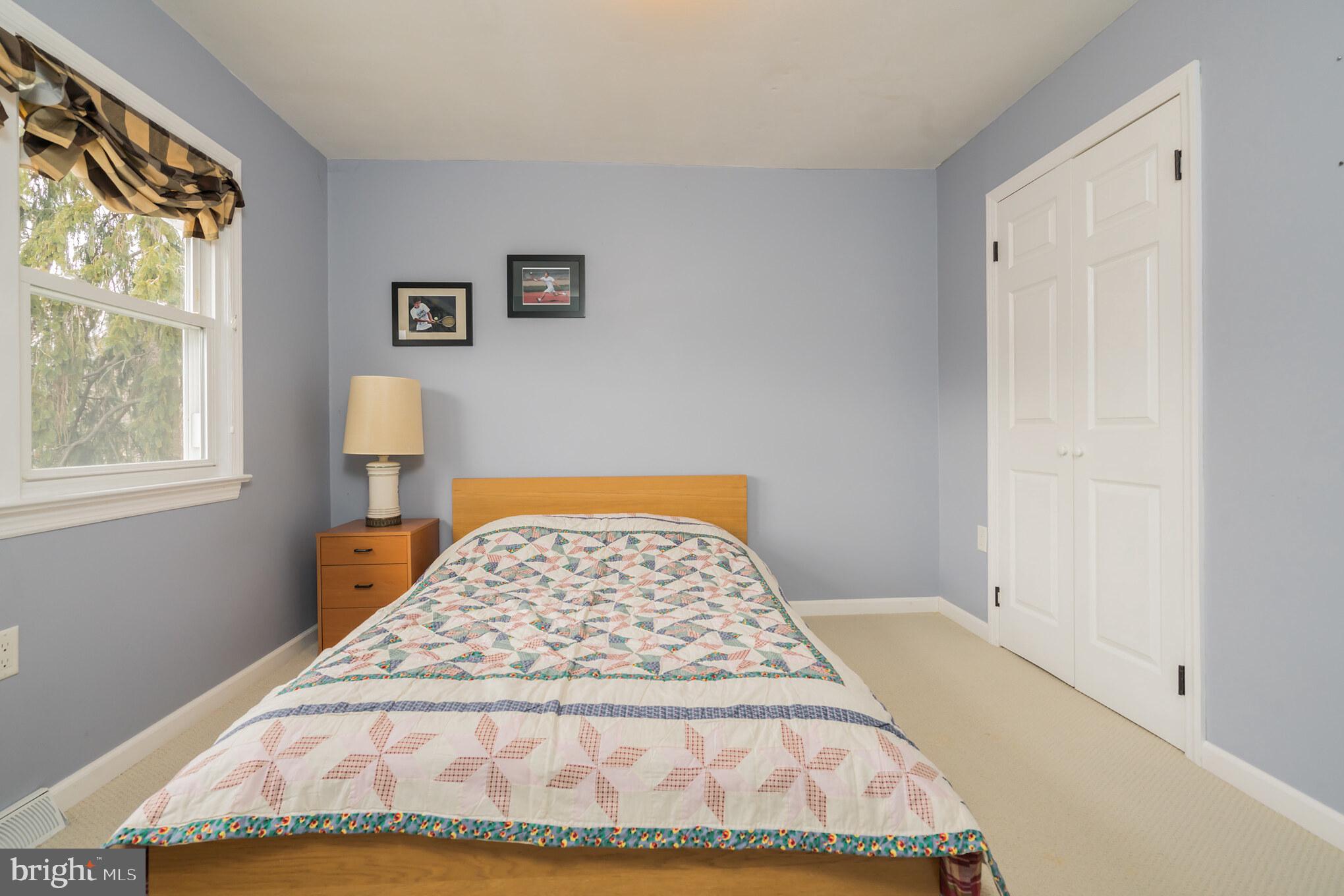 14 Azalea Way Hamilton, NJ 08690 - Photo 23 of 33 a bedroom with a bed and a window