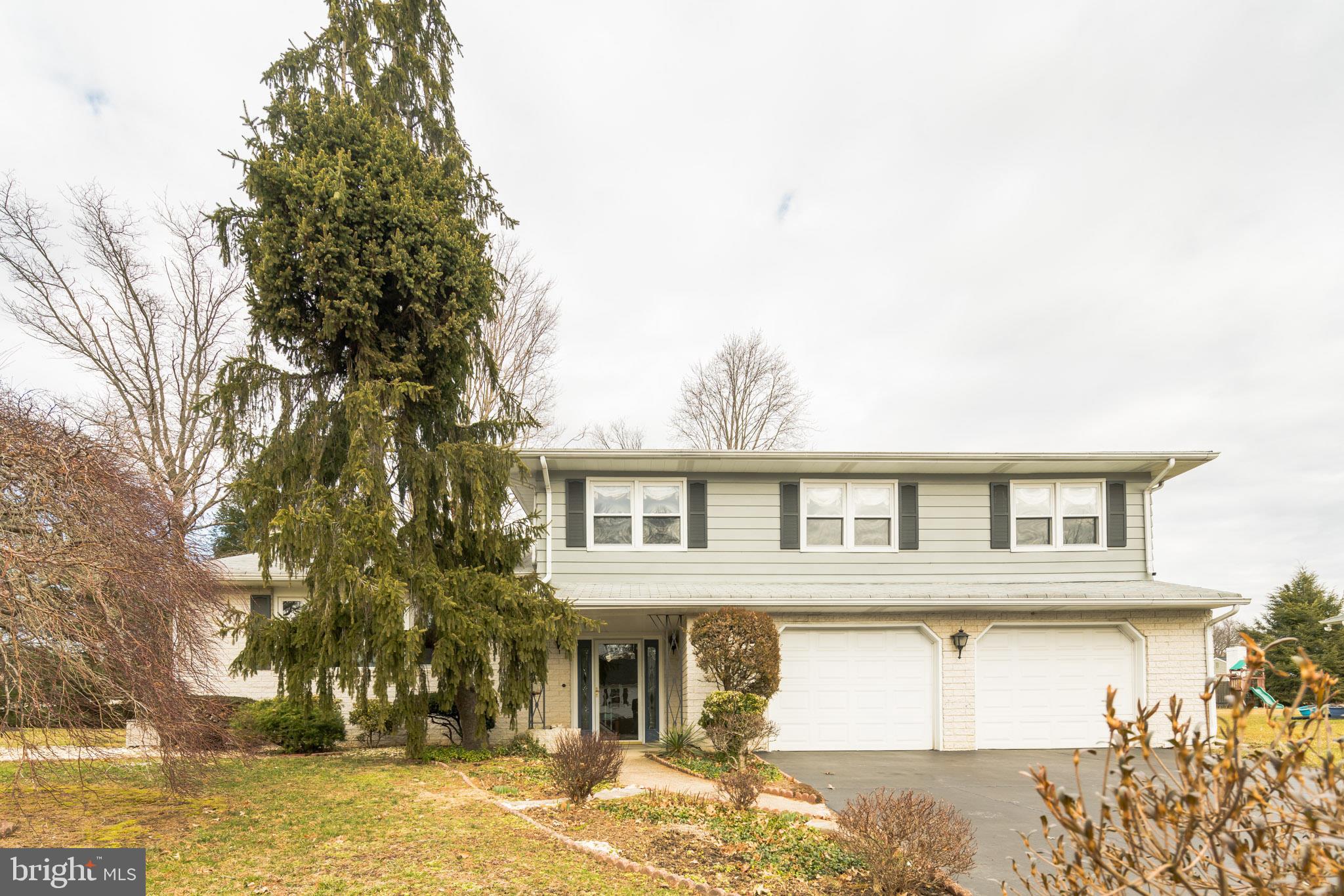 14 Azalea Way Hamilton, NJ 08690 - Photo 31 of 33 a front view of a house with a yard