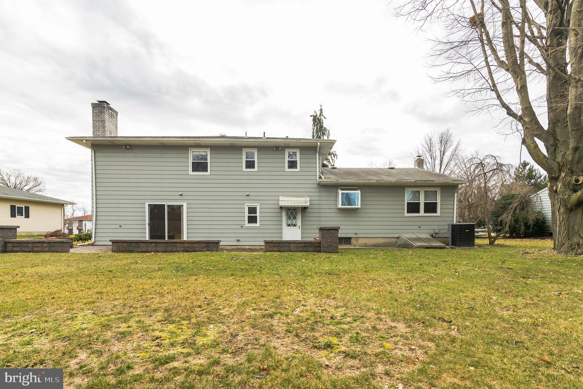 14 Azalea Way Hamilton, NJ 08690 - Photo 32 of 33 a front view of a house with a yard