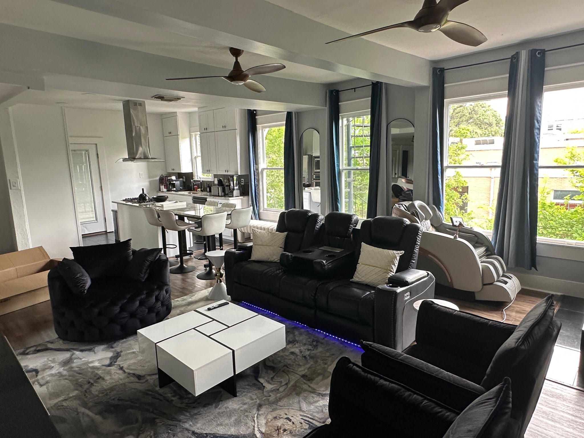 3210 Hampton Road, Unit A B C Austin, TX 78705 - Photo 20 of 42 Living area featuring dark wood-style flooring and a ceiling fan