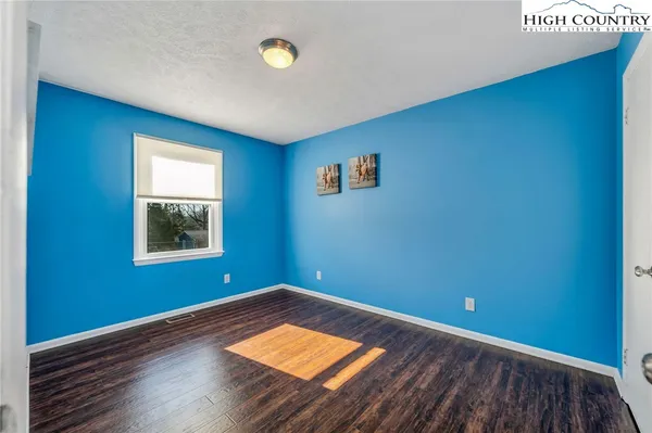 an empty room with window