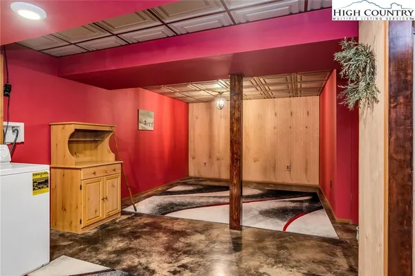 a room with a bed and a window