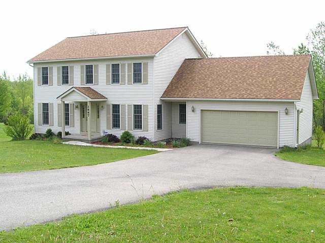1447 Wayneport Road Macedon, NY 14502 - Photo 1 of 1 Exterior Front. This classic center-entrance colon
