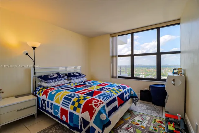 a bedroom with a bed and a small place