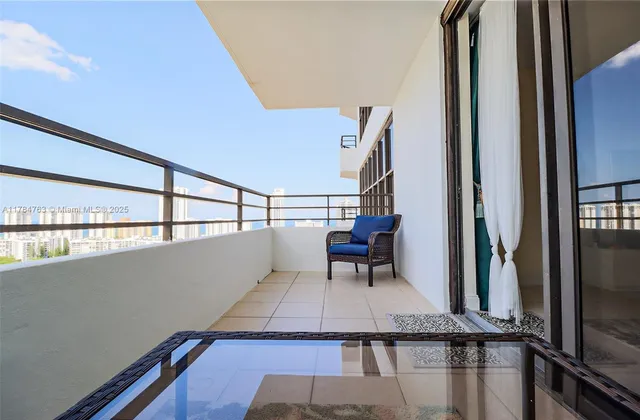 a bathroom with a double vanity sink mirror and shower