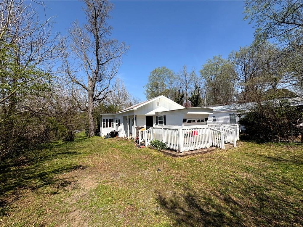 440 Cherry Street Southeast Acworth, GA 30102 - Photo 19 of 73 a white house that has a tree in front of it