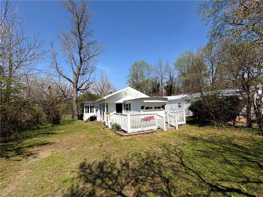 440 Cherry Street Southeast Acworth, GA 30102 - Photo 20 of 73 a white house that has a tree in front of it