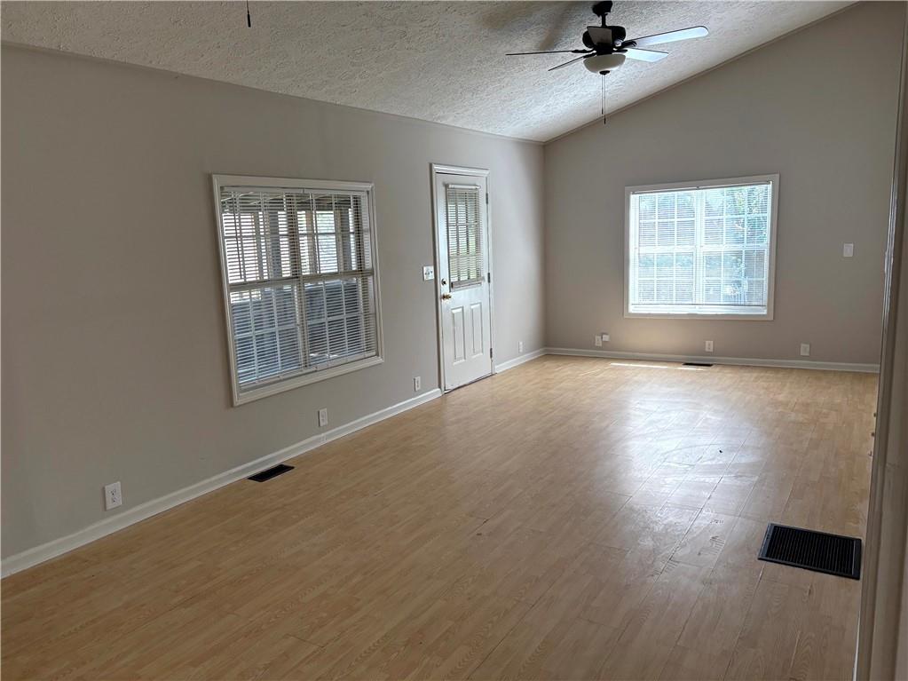 440 Cherry Street Southeast Acworth, GA 30102 - Photo 3 of 73 a view of an empty room with a window