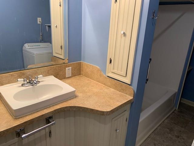 440 Cherry Street Southeast Acworth, GA 30102 - Photo 31 of 73 a bathroom with a sink and a mirror