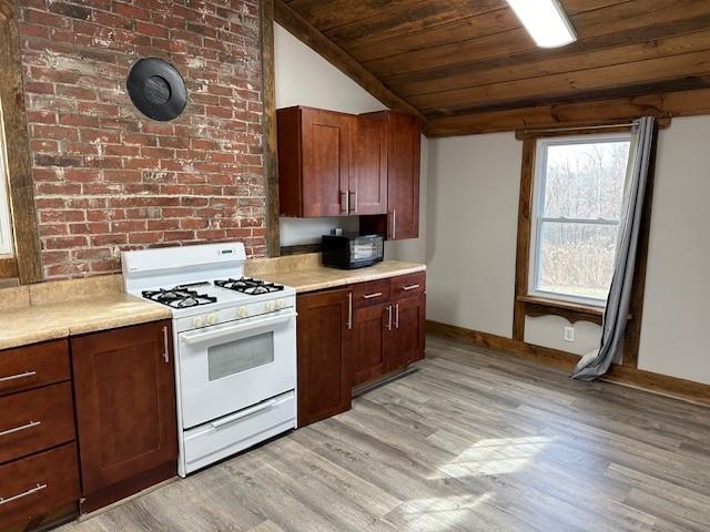 440 Cherry Street Southeast Acworth, GA 30102 - Photo 32 of 73 a kitchen with a stove and a microwave