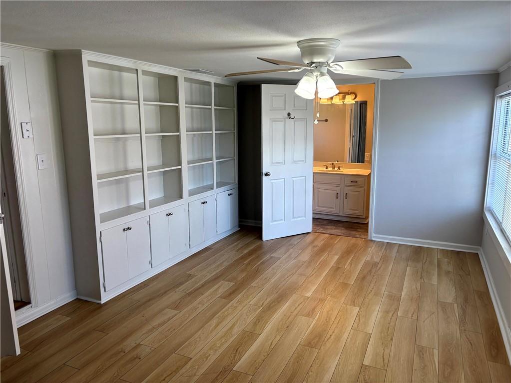 440 Cherry Street Southeast Acworth, GA 30102 - Photo 4 of 73 wooden floor in an empty room with a window