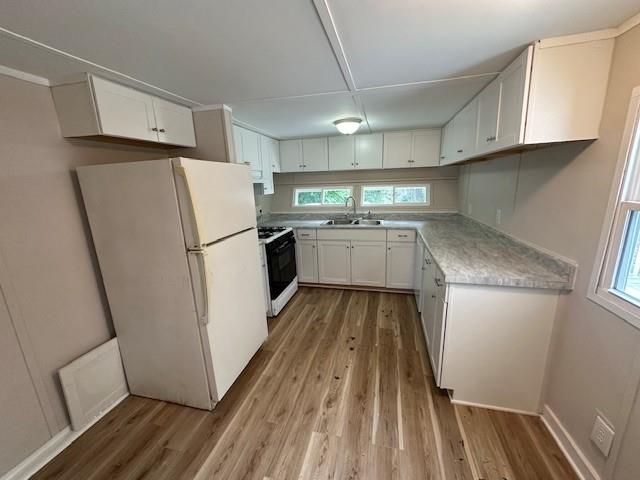 440 Cherry Street Southeast Acworth, GA 30102 - Photo 65 of 73 a kitchen with a refrigerator a sink and dishwasher