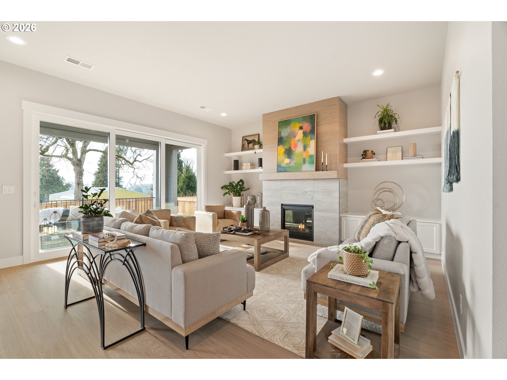 4192 Cornwall Street West Linn, OR 97068 - Photo 37 of 44 a living room with furniture a fireplace and a large window
