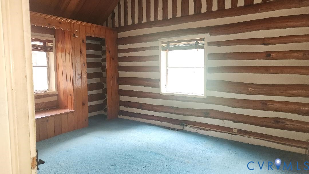 415 Springdale Avenue Colonial Heights, VA 23834 - Photo 16 of 21 a view of walk in closet with empty racks