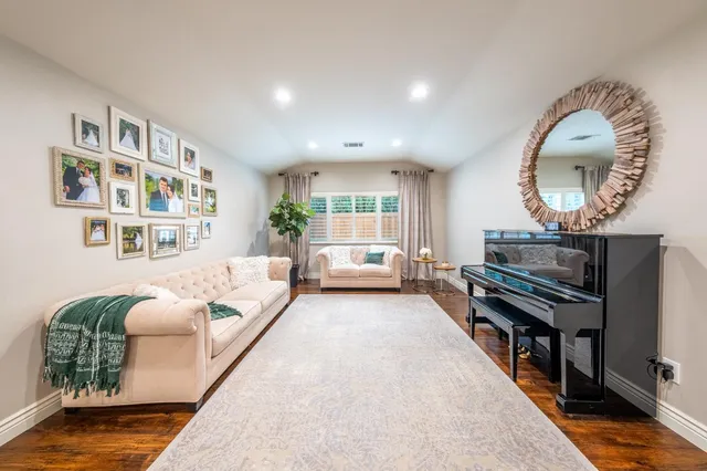 a view of a dining area with furniture window and wooden floor