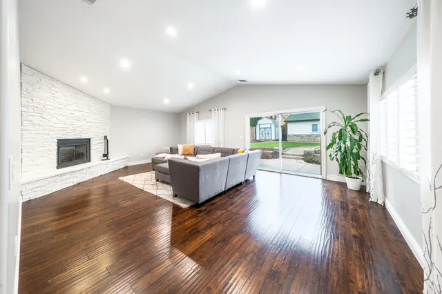 a bedroom with furniture and a book shelf
